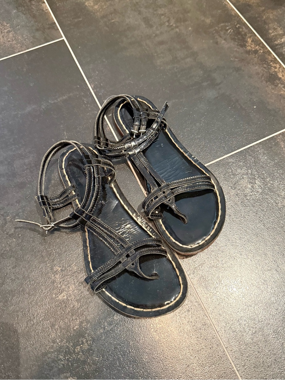 Bernardo black leather sandals with tan trim details